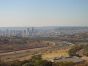 Der Blick auf Pretoria vom Voortrekker-Monument aus. Rechts oben kann man das Parlamentsgebäude und Freedom-Park erkennen.